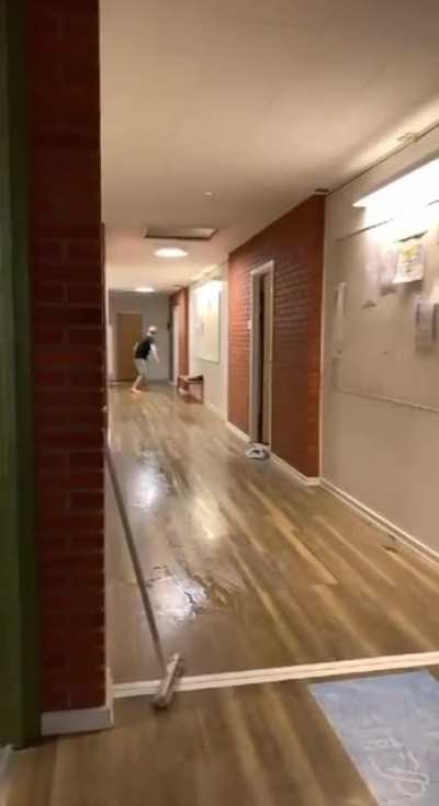 WCGW sliding through a hallway.