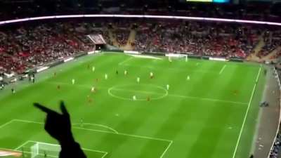 hitting a football player with a paper airplane.