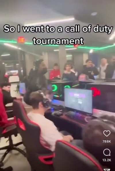 Competitive gamers or competitive clappers. Hard to tell.