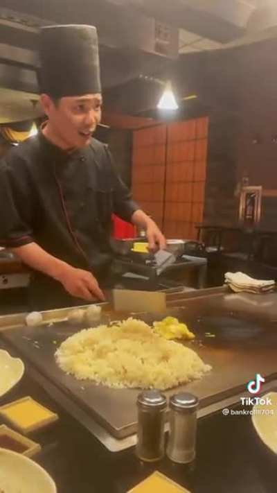 Just a lady being cringe with a chef who is cooking/performing for others too.