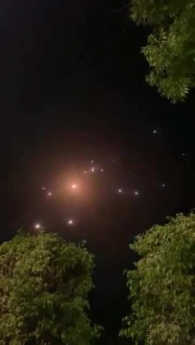 Palestinian rockets (right to left) intercepted over Tel Aviv