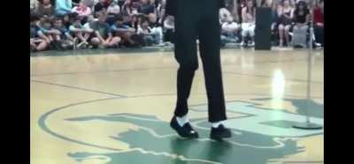 Kid does moonwalk flawlessly. Link: