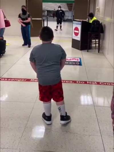 His little sister has been away for a week and this is the longest they've ever been apart. Big brother can't contain his excitement as he eagerly awaits her arrival at the airport.