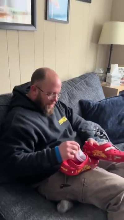 Wife surprises her husband a present.