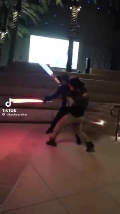 Very epic lightsaber duel irl