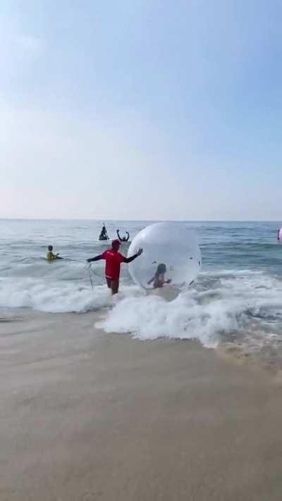 [OC] Girl Goes Inside Plastic Bubble at Beach