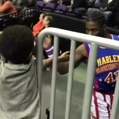 Taking the extra time to make this fan's "high five" a memorable one