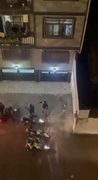 Iranian protesters are running away from police and suddenly some random person opens the doors for them