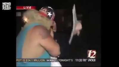 Kissing reporters live.