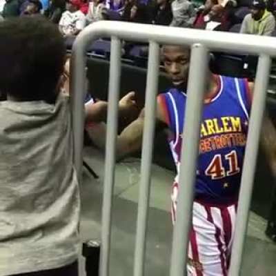 Taking the extra time to make this fan's "high five" a memorable one