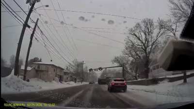 Idiot fails to yield on green during fresh snowfall [oc]