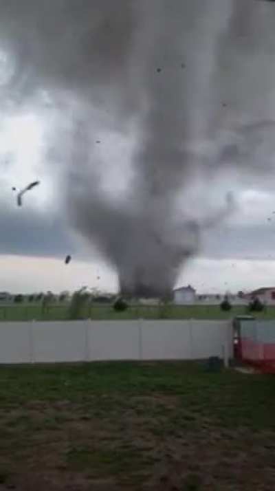 Man continues to film Andover Tornado right up until it swallows his yard