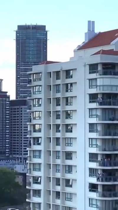 Flying a Boeing C-17 Globemaster through the middle of a city in Australia.