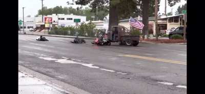 Truck had right of way as they were a registered member of the parade that was and had been in progress on a section of roadway that was closed to traffic for the parade and the motorcycle pulled out onto the parade route heading in the opposite direction