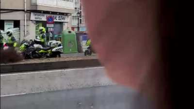 Police motorcycles crash into each other