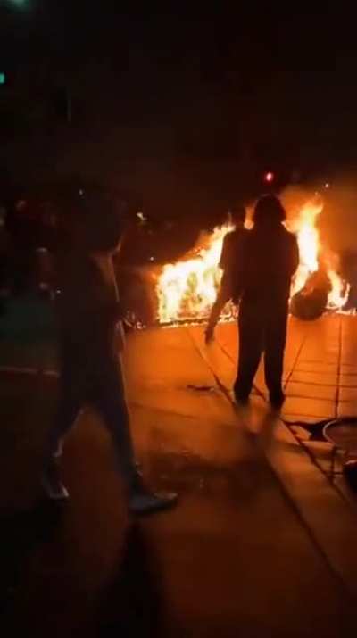 Car drifting too close to the fire