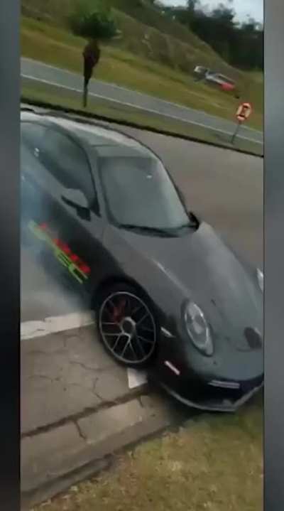 Idiot Driver vs. Light Pole