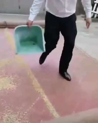 The way he scoops up debris from a rug