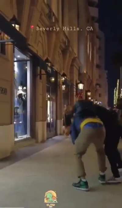 This dude pushes a stranger into a lady and gets rekt