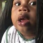 Baby kept pulling at her wig so she let him wear it.