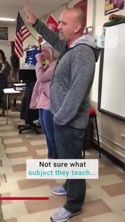 Teachers' proposal in front of class.