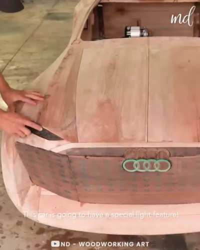 Vietnam dad builds fully-functional wood car for his daughter on her first birthday. It is amazing art and it took him 75 days to build, ?