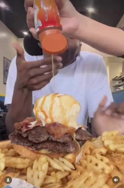 Yes that is ice cream on top of that burger, and yes that’s caramel sauce being poured onto it