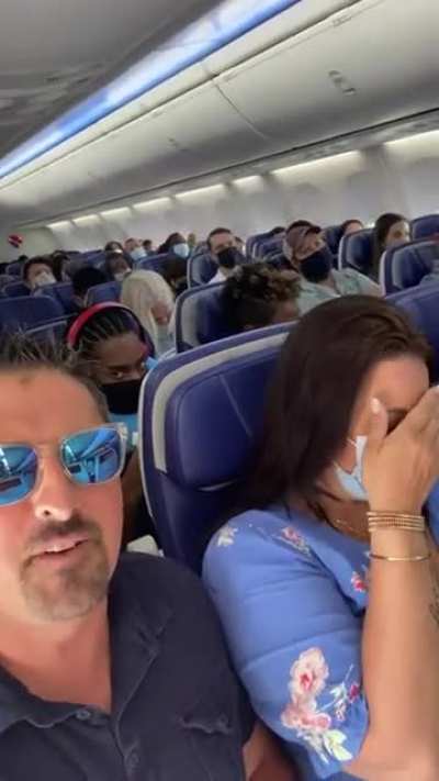 the 2 sitting next to him ?