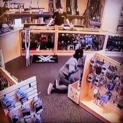 At the gun shop.