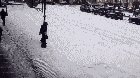 A woman slipped on the ice. Let's rush to help her