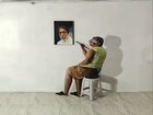 The guy just finished painting