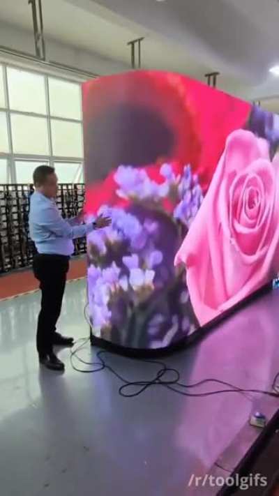 Flexible LED panels make up a curved display wall