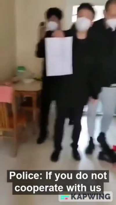 Chinese protestor being arrested for disrupting their social unit's order