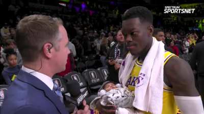 [Highlight] Dennis Schroder with a huge smile during the post-game interview holding his newborn child