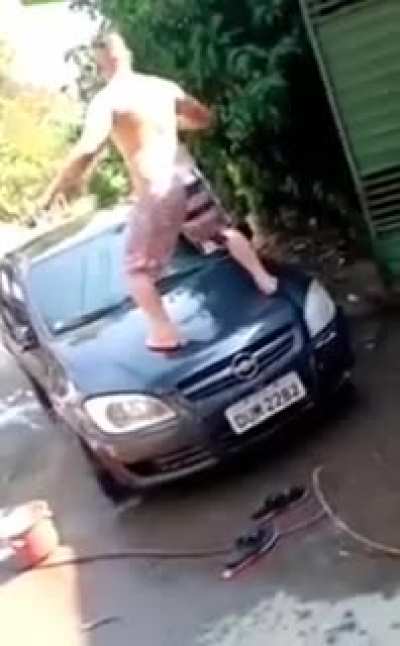 Having a dance on a wet car
