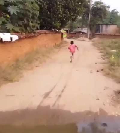 Kids seeing a drone for the first time.