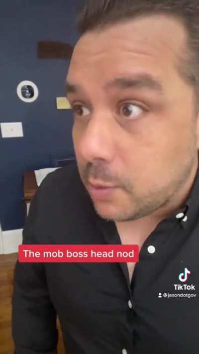 The mob boss head nod