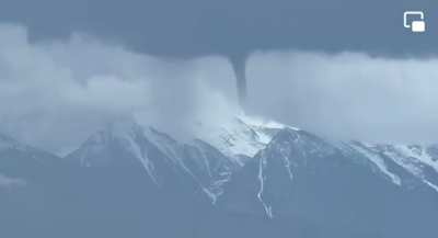 First time ever a Twister was filmed touching down the top of a mountain
