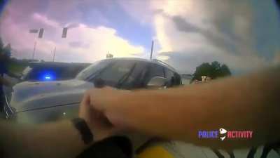 Woman with child in car rams multiple people &amp; police cars while trying to avoid arrest
