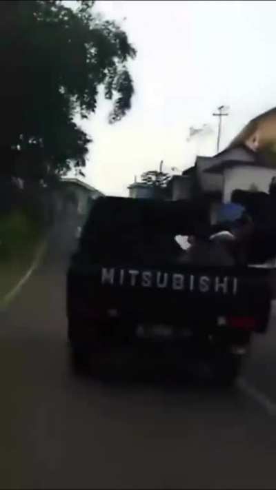 WCGW Riding an untied and unsecured scooter on top of a moving pickup truck
