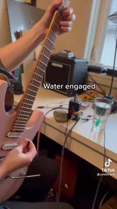 Running guitar through water