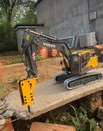 Powerful toy breaking concrete.