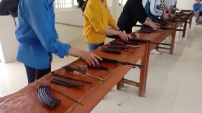 11th grade students in public schools in Vietnam are all taught how to disassemble and reassemble military rifles - Such as the AK-47, the class subject is called "National Defense Education"