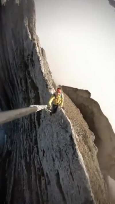 this person climbed up this mountain in Switzerland and got this incredible shot..