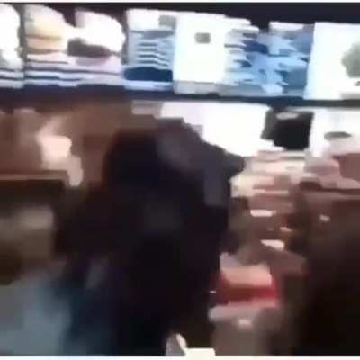 Racist kid calls man in front of him ordering a "black guy", gets thrown across the counter