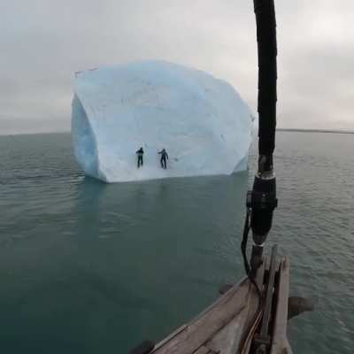 Mike Horn and Fred Roux climbing on iceberg but it tipped over. Both survived