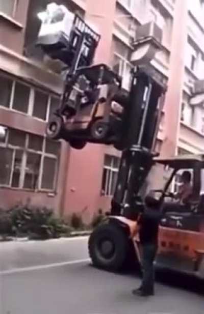 WCGW using a forklift to lift another forklift thats already lifting s**t