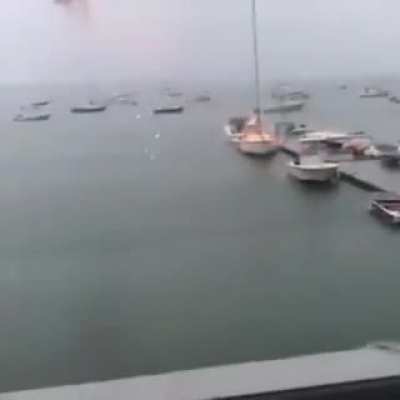 Cameraman manages to capture a boat being struck by lightning
