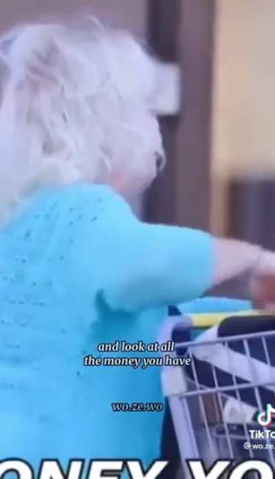 Man asks for money to an old woman.