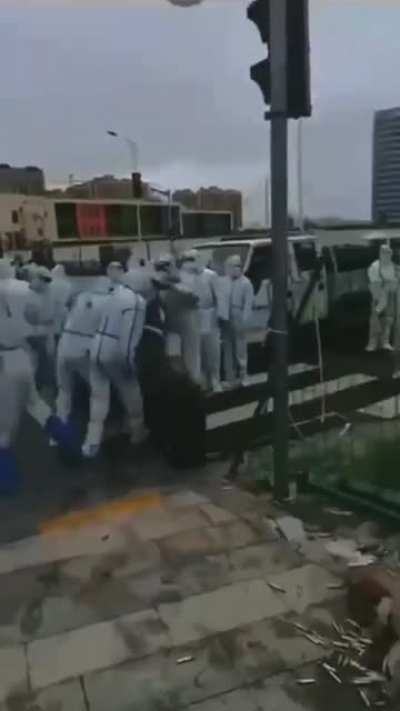 People in hazmat suits "Big Whites" abusing their power during the current lockdown in Shanghai
